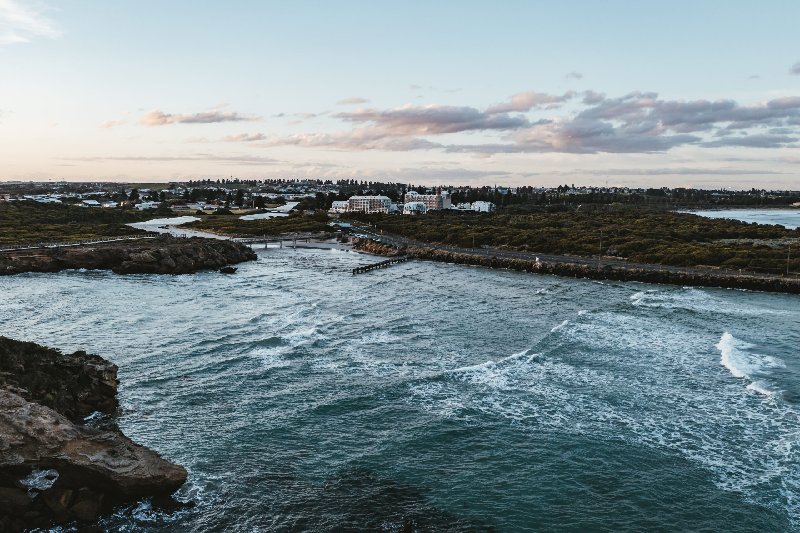 Aerial view of the Ocean in Warrnambool with Deep Blue Hotel & Hot Springs in the bac