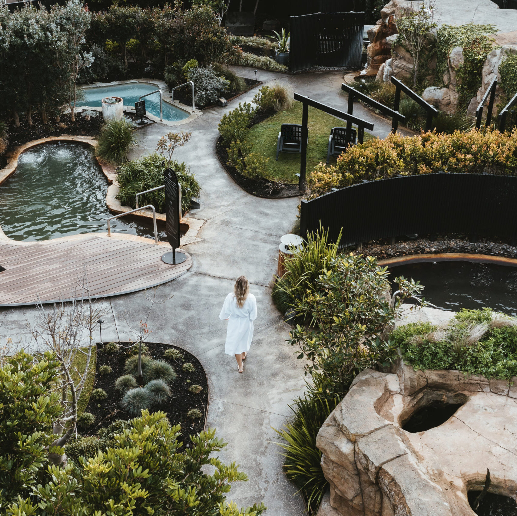Deep Blue Hot Springs - Drone girl walking